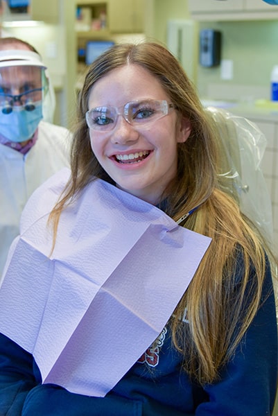 orthodontic patient after braces treatment smile results